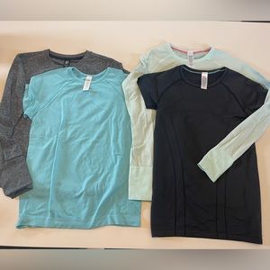 Lot of 4 Ivivva and Athleta Girl shirts (like Lululemon Swiftly)
